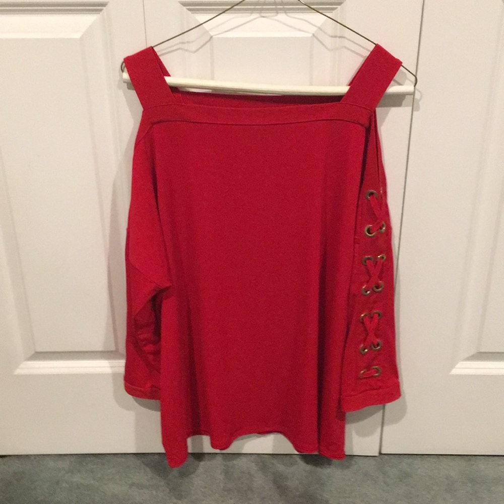 Red wrinkle free material red shirt.
